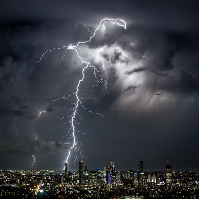 City Lights and Thunder Strikes: Capturing Nature’s Drama