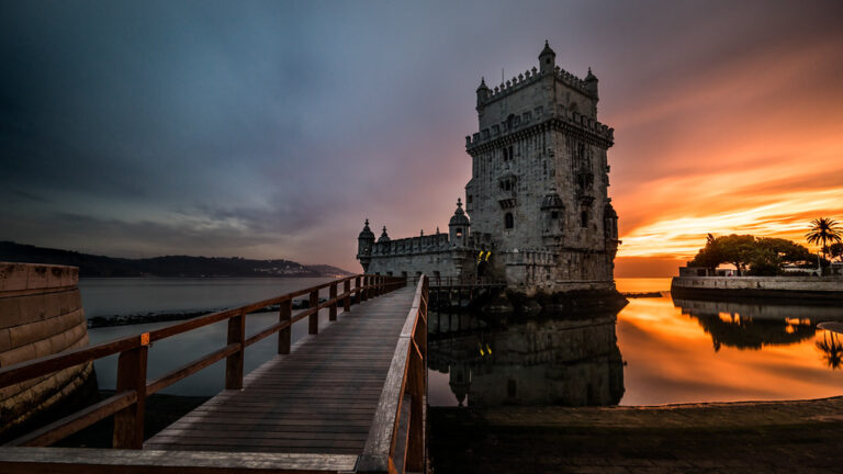 Belem Tower at Sunset: A Dance of Light and History