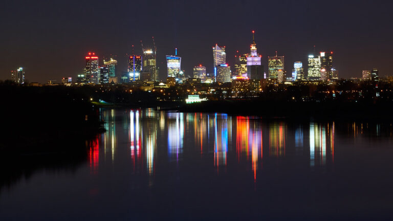 Reflections of Warsaw’s Skyline: Night’s Silent Symphony